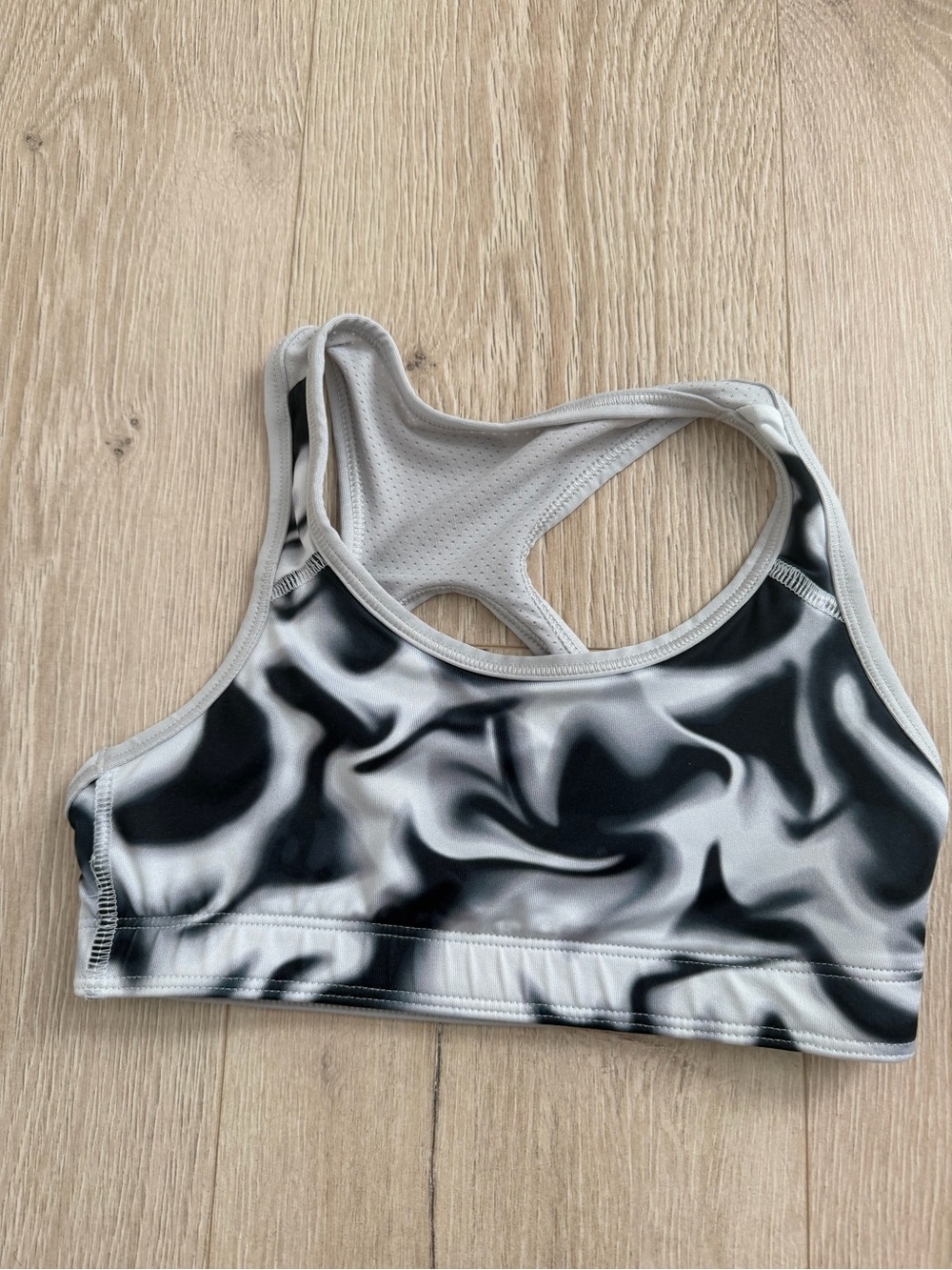 Girl’s Black & White Racerback Sports Bra and solid black sports bra